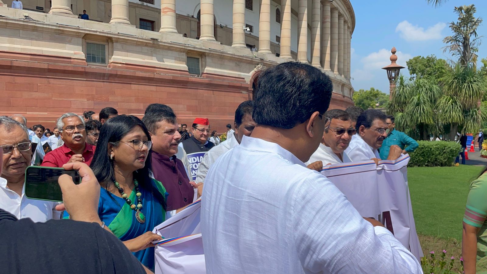 NDA-INDIA Standoff at Parliament’s Gandhi Statue Over Crimes Against Women.